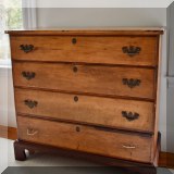 F23. Antique four-drawer dresser. 38”h x 40”w x 19”d 